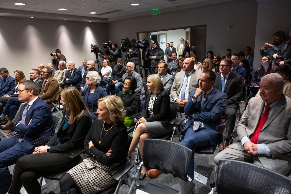 People listen during a press conference about campus free speech at the Utah System of Higher Education office in Salt Lake City on Friday, Dec. 1, 2023. | Spenser Heaps, Deseret News