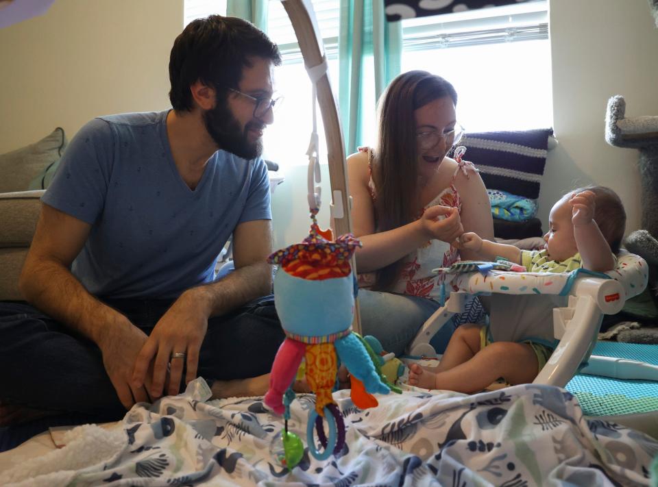 Michael, 34, and Laura Kleiman, 29, spend time in their new home taking care of their 4-month-old baby, Saturday, Aug. 19, 2023, in Port St. Lucie. The couple moved into the newly built home in December 2022 from Margate. "The only way to afford the house was the student loan pause," said Michael. "We were able to save for the down payment and for emergency funds." Port St. Lucie is the fourth best city across the nation for buying a first home, according to a study conducted by WalletHub published in July 2023.