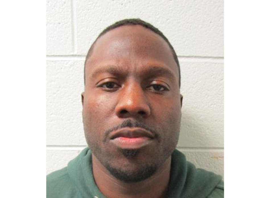 This undated photo provided by the Utah Department of Corrections shows Melvin Rowland. Authorities say that Rowland, suspected of killing his ex-girlfriend, University of Utah student-athlete Lauren McCluskey, was found dead in an off-campus church early Tuesday, Oct. 23, 2018. (Utah Department of Corrections via AP)