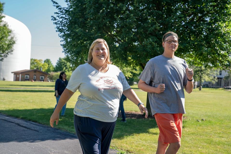 Sam (Bridget Everett) and her bestie Joel (Jeff Hiller) getting their steps in.