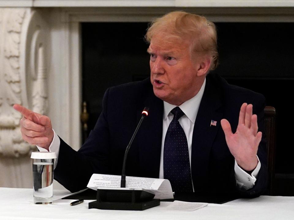 President Donald Trump tells reporters that he is taking zinc and hydroxychloroquine during a meeting with restaurant industry executives about the coronavirus response, in the State Dining Room of the White House, Monday, May 18, 2020, in Washington. (AP Photo/Evan Vucci)