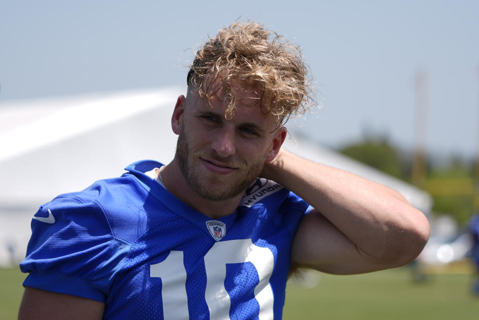 Los Angeles Rams wide receiver Cooper Kupp walks off the field during an NFL football organized team activity Tuesday, May 21, 2024, in Thousand Oaks, Calif. (AP Photo/Ryan Sun)