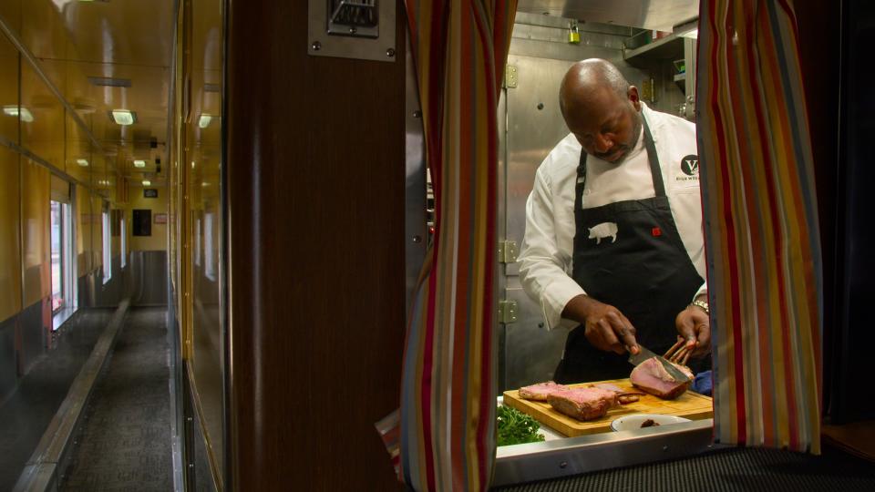 Man chopping meat in photo from Netflix's "High on the Hog."