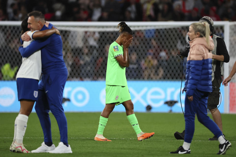 Nigeria's players leave the pitch after losing the Women's World Cup round of 16 soccer match against England in Brisbane, Australia, Monday, Aug. 7, 2023. (AP Photo/Tertius Pickard)