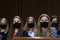 Family members of Supreme Court nominee Amy Coney Barrett listen during her confirmation hearing before the Senate Judiciary Committee on Capitol Hill in Washington, Tuesday, Oct. 13, 2020. (Tom Williams/Pool via AP)