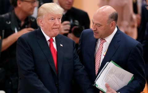 Donald Trump, left, with Gary Cohn, the president's former top economic adviser - Credit: AP Photo/Michael Sohn
