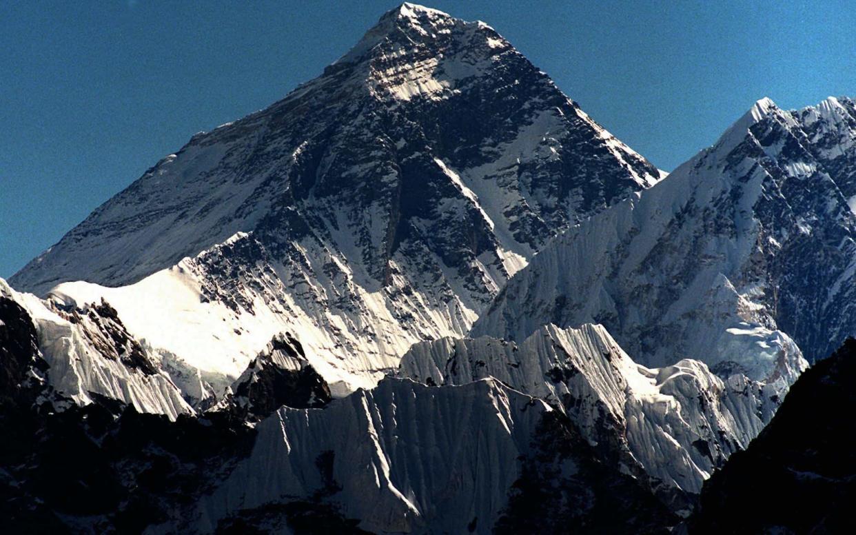 Mount Everest is seen from peak Gokyo Ri in Nepal. - Copyright 2016 The Associated Press. All rights reserved. This material may not be published, broadcast, rewritten or redistribu