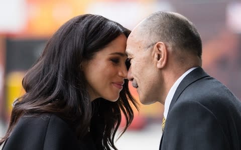 The Duchess of Sussex and Sir Jerry Mateparae perform a traditional Maori greeting - Credit: Kelvin Bruce