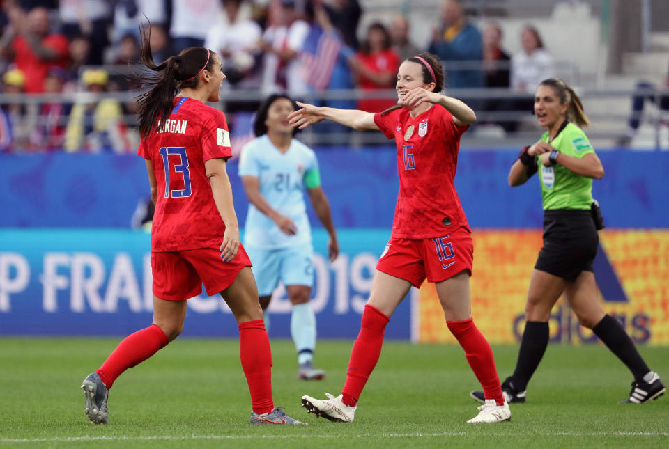 REIMS, FRANCE - JUNE 11: Rose Lavelle of the USA celebrates with teammate Alex Morgan after scoring her team's second goal during the 2019 FIFA Women's World Cup France group F match between USA and Thailand at Stade Auguste Delaune on June 11, 2019 in Reims, France. (Photo by Robert Cianflone/Getty Images)