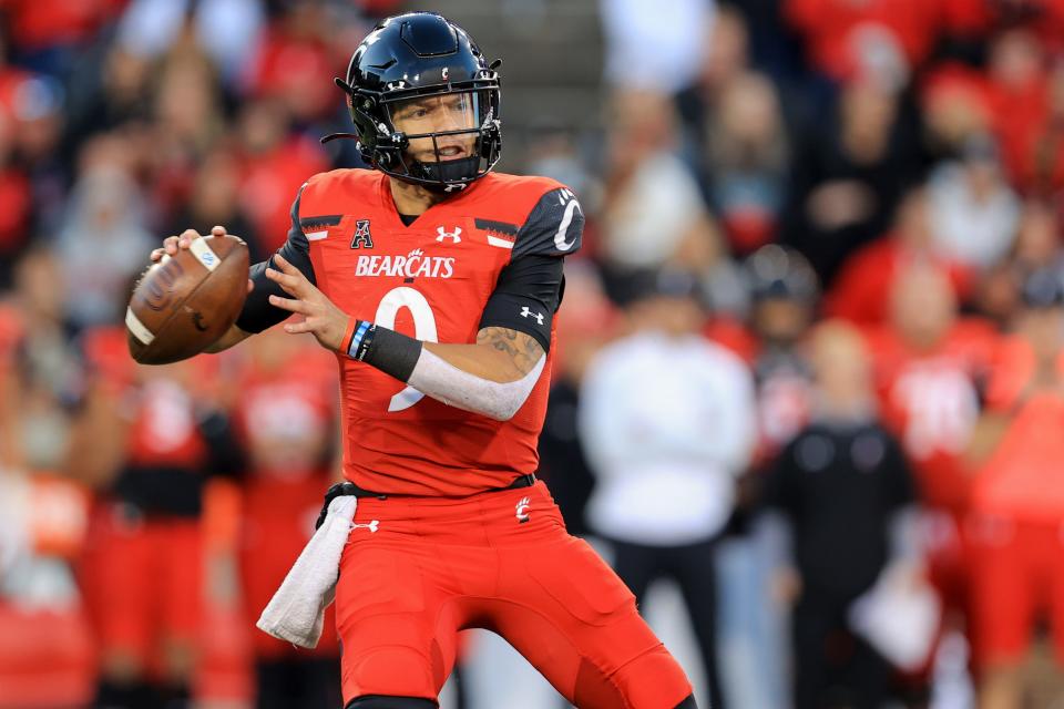 Cincinnati Bearcats quarterback Desmond Ridder (9) drops back to pass against the Tulsa Golden Hurricane in the second half at Nippert Stadium.