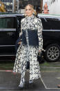 <p> J. Lo has blessed us with many coats throughout her long professional career, and she must have really loved this epic snakeskin-patterned-and-black coat—because she matched her dress <em>and</em> boots to it. And her satchel bag even matches the strip of black across the coat! </p>