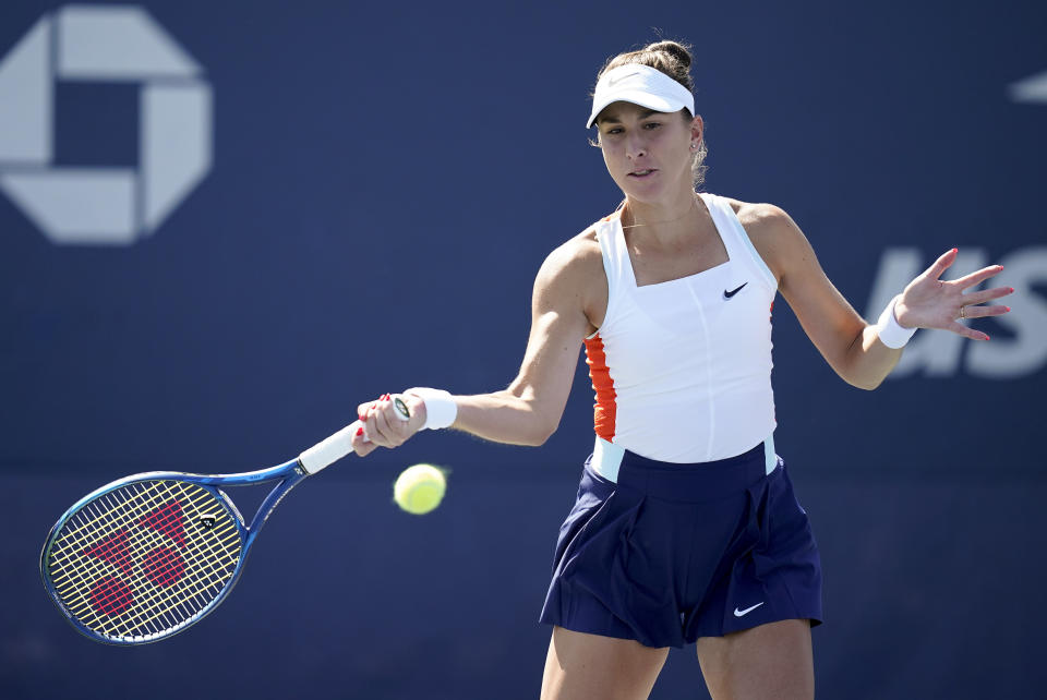 Belinda Bencic, of Switzerland, returns a shot to Soraya Cirstea, of Romania, during the second round of the U.S. Open tennis championships, Thursday, Sept. 1, 2022, in New York. (AP Photo/Julia Nikhinson)