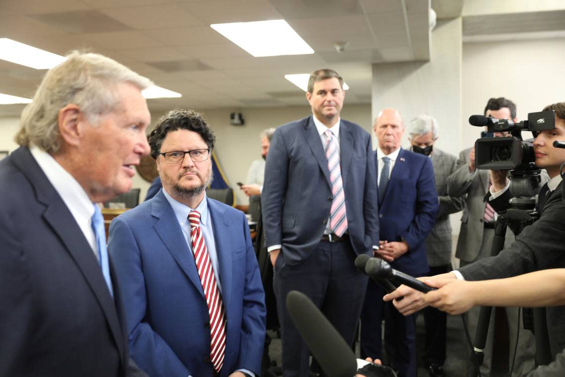 South Carolina Senate Finance Committee Chairman Harvey Peeler, R-Gaffney, left, and House Ways and Means Chairman Gary Simrill, R-Rock Hill, center, speak to reporters, while House Speaker Murrell Smith, R-Sumter, right, listens after a conference committee approved South Carolina’s $13.8 billion budget for next year on June 10, 2022, in Columbia, S.C. (AP Photo/Jeffrey Collins)