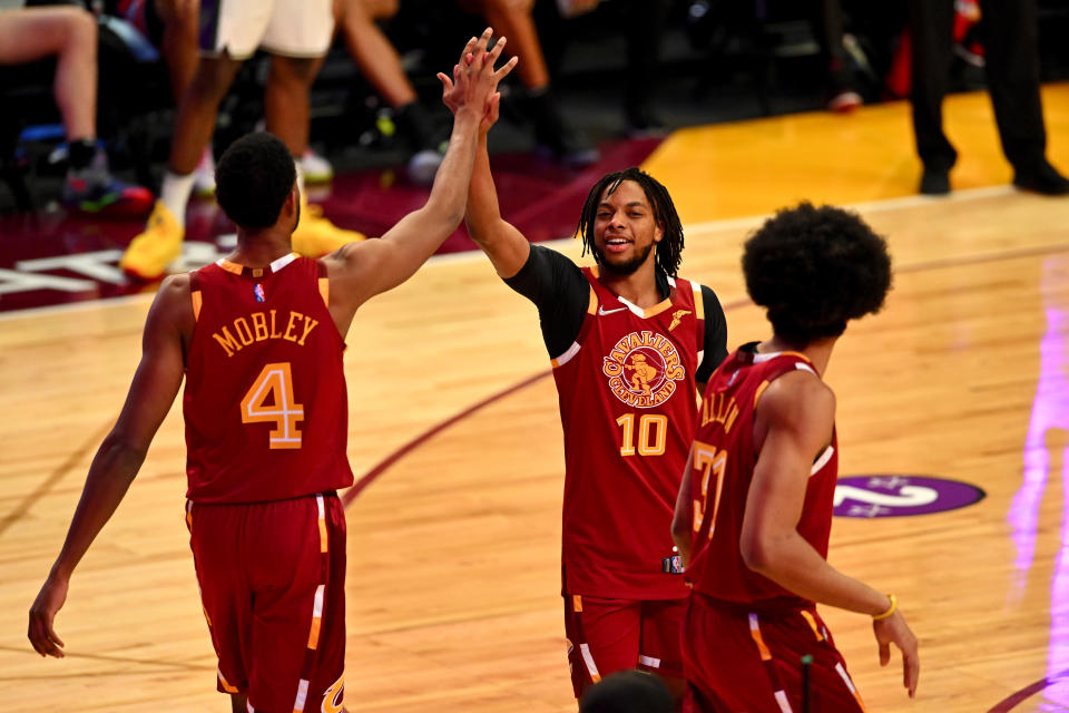 CLEVELAND, OHIO - FEBRUARY 19: Evan Mobley #4 of Team Cavs reacts with teammate Darius Garland #10 during the Taco Bell Skills Challenge as part of the 2022 All-Star Weekend at Rocket Mortgage Fieldhouse on February 19, 2022 in Cleveland, Ohio. NOTE TO USER: User expressly acknowledges and agrees that, by downloading and or using this photograph, User is consenting to the terms and conditions of the Getty Images License Agreement. (Photo by Jason Miller/Getty Images)