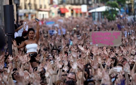 FILE PHOTO: Protesters attend a demonstration against the release on bail of five men known as the "Wolf Pack" cleared of gang rape of a teenager and convicted of a lesser crime of sexual abuse in Madrid