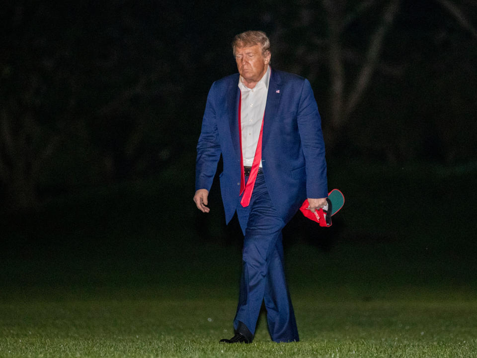Donald Trump, returning from a campaign rally in Tulsa, Oklahoma, 21 June, 2020AP