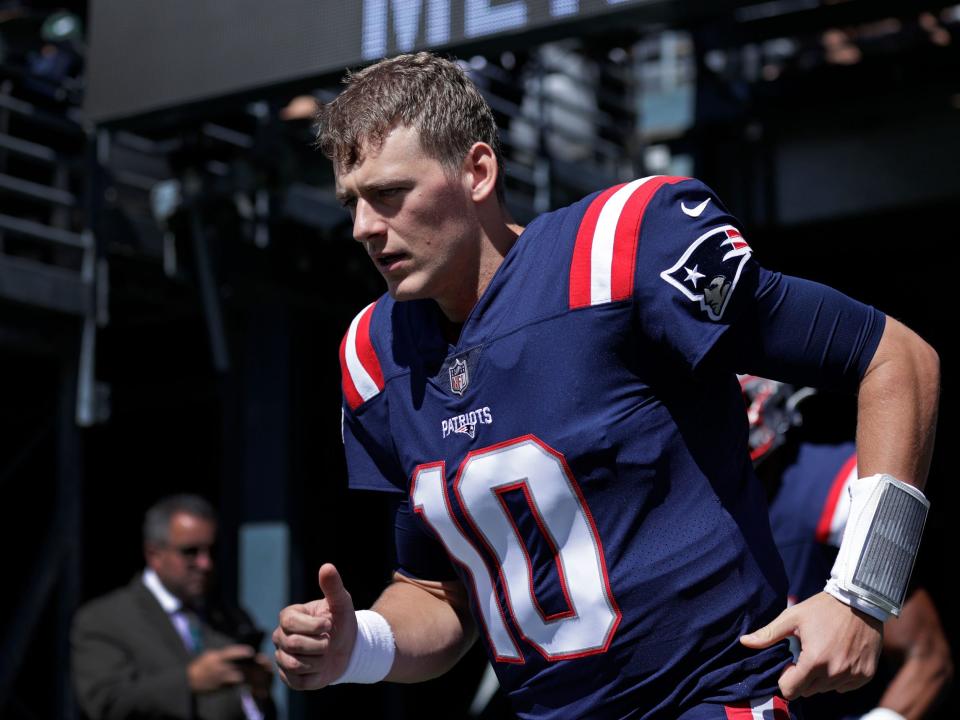 Mac Jones takes the field for a game against the New York Jets.