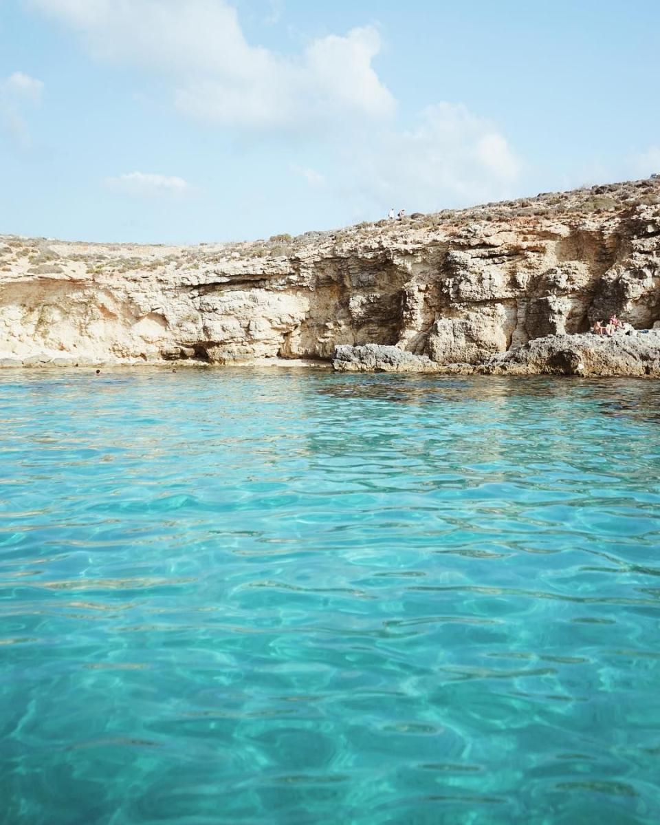 <p>Comino is the smallest of three islands in Malta. It's a tiny little chunk of limestone—one and a half miles long and just under a mile wide—with just a single hotel (Comino Hotel). Still, it's one of the most popular destinations in Malta, mostly thanks to its remote, barren landscape and stunning blue lagoons. <br></p>