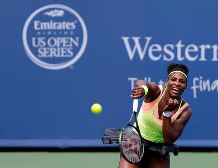 Aug 19, 2015; Cincinnati, OH, USA; Serena Williams (USA) returns a shot against Tsventana Pironkova (not pictured) on day five during the Western and Southern Open tennis tournament at Linder Family Tennis Center. Mandatory Credit: Aaron Doster-USA TODAY Sports