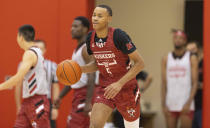 Nebraska NCAA college basketball player Bryce McGowens drives down court during the Nebraska team's Pro Day workout Tuesday, Oct. 5, 2021, at the Hendricks Training Complex in Lincoln, Neb. (AP Photo/Rebecca S. Gratz)
