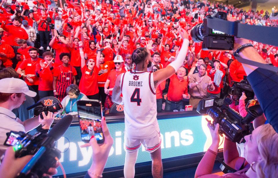 Auburn Tigers forward Johni Broome (4) pumps up the crowd after the game as Auburn Tigers take on Alabama Crimson Tide at Neville Arena in Auburn, Ala., on Wednesday, Feb. 7, 2024. Auburn Tigers defeated Alabama Crimson Tide 99-81.