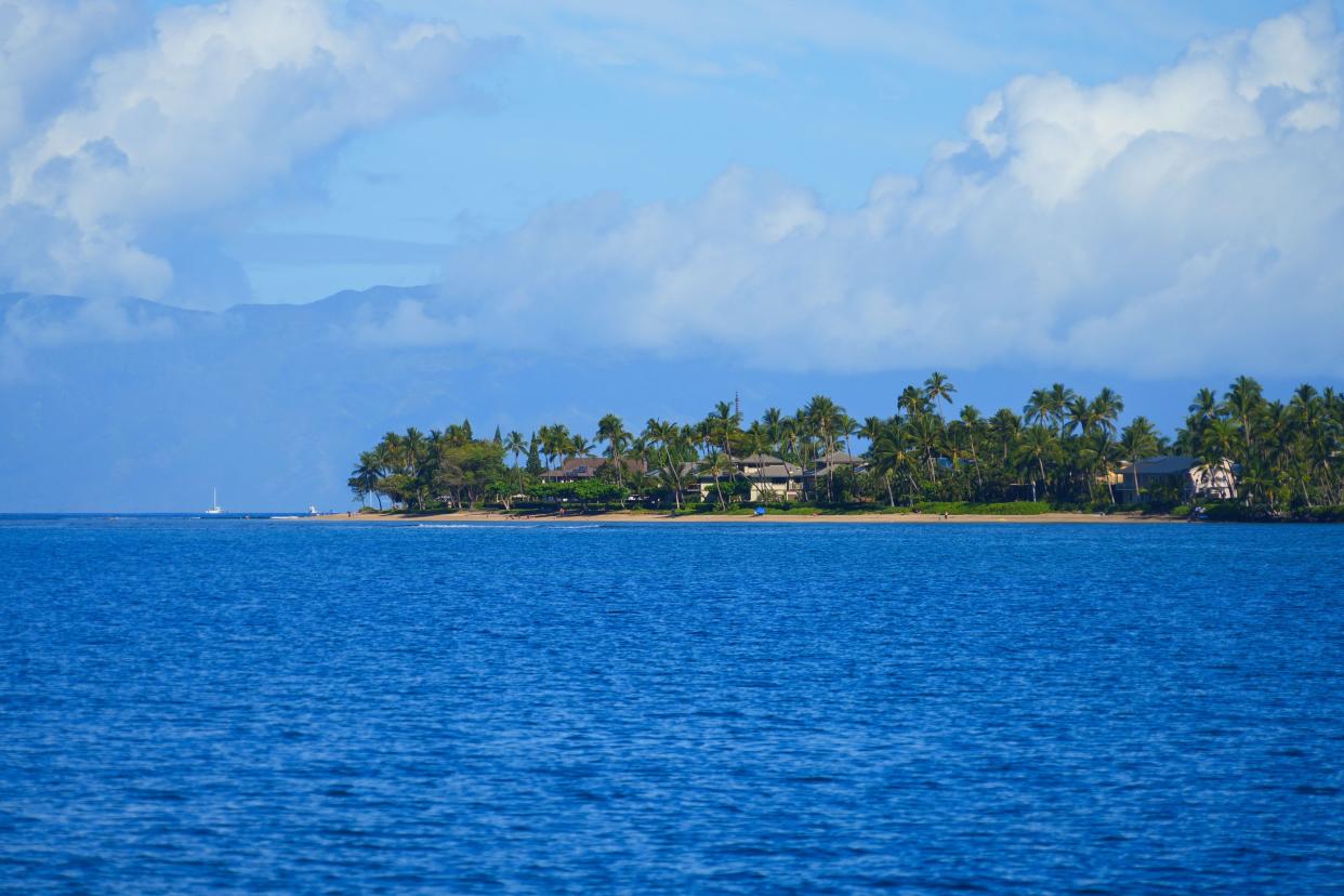 Baby Beach near Lahaina on West Maui in Hawaii with the island of Lanai in the background