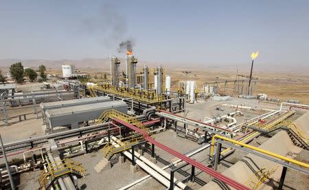 A flame rises from a chimney at Taq Taq oil field in Arbil, in Iraq's Kurdistan region, in this August 16, 2014 file photo. REUTERS/Azad Lashkari/Files