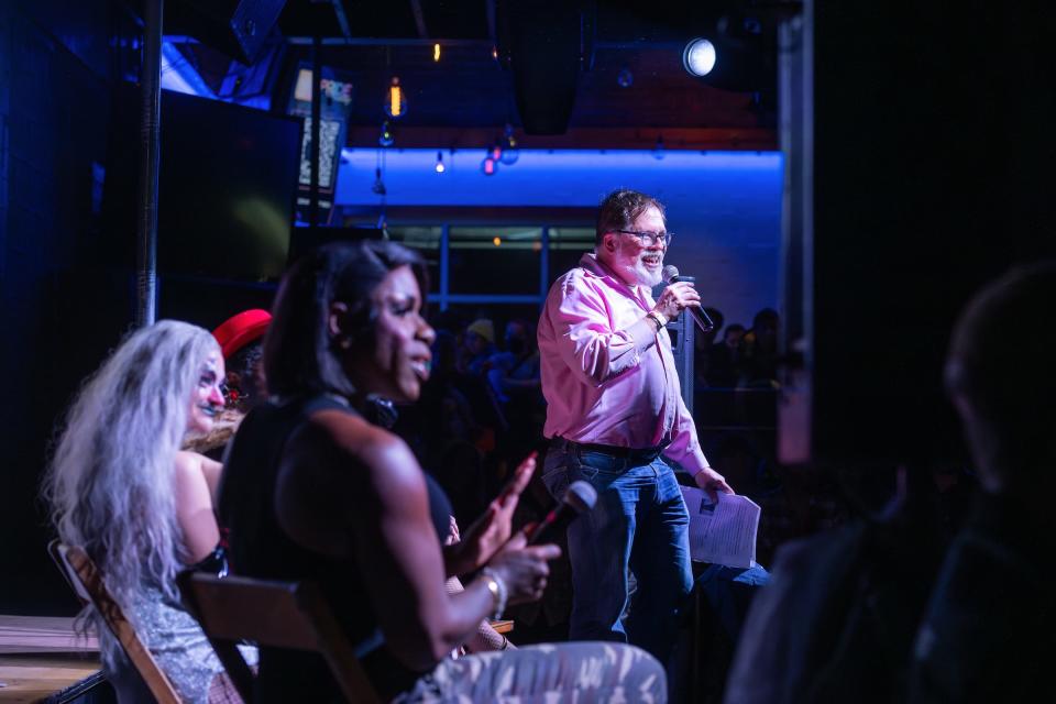 Lawrence La Fountain-Stokes, right, moderates a panel discussion on drag at Necto Nightclub in Ann Arbor. It was part of the University of Michigan's Arts & Resistance theme semester.