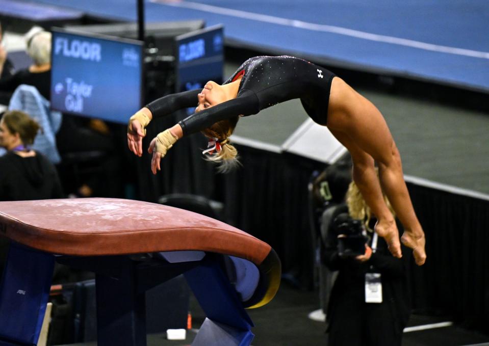 Utah’s Cami Winger reaches out for the vault as BYU, Utah, SUU and Utah State meet in the Rio Tinto Best of Utah Gymnastics competition at the Maverick Center in West Valley City on Monday, Jan. 15, 2024. | Scott G Winterton, Deseret News