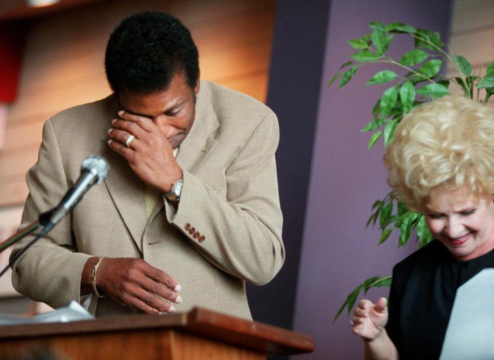 Charley Pride, left, is emotional just after learning he has been elected as the newest member of the Country Music Hall of Fame June 16, 2000 during Fan Fair week. He was named along with Faron Young by Hall of Fame member Brenda Lee, right, during a press conference at the hall.