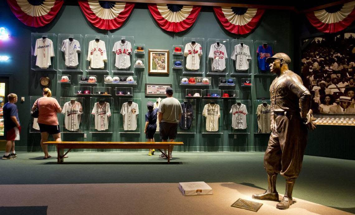 Ed and Sheri Curtin, along with their two sons Eddie, 12 and Austin, 10, toured the Negro Leagues Baseball Museum Tuesday morning. ``It’s really amazing, and a good way to teach them (sons) the history,’’ Sheri said. The family, from Tucson, Arizona, are all Boston Red Sox fans RICH SUGG/The Kansas City Star_07022013. Rich Sugg/rsugg@kcstar.com