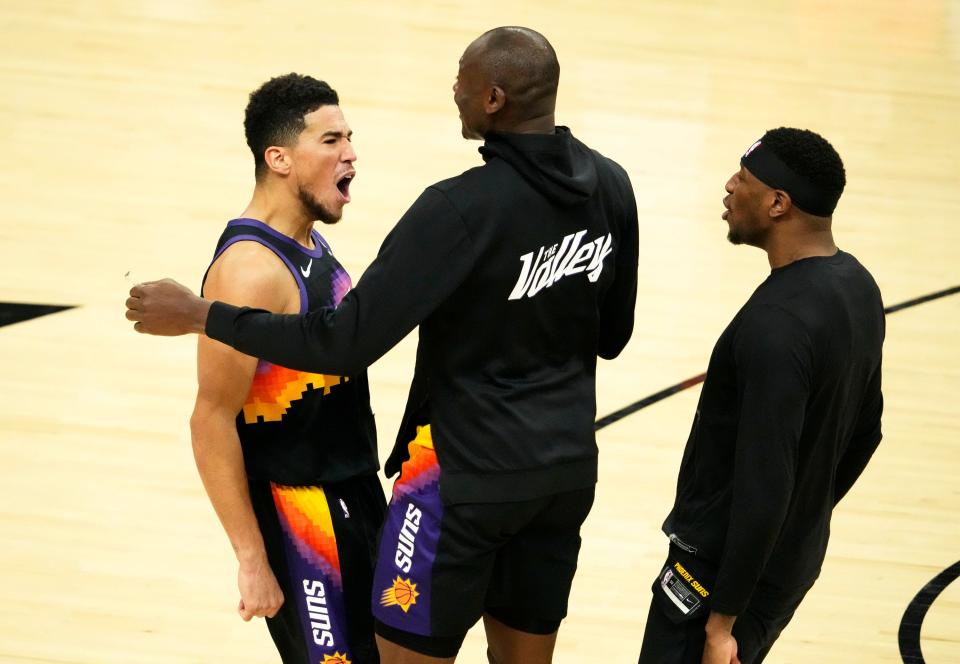 May 10, 2022; Phoenix, Arizona, USA; Phoenix Suns guard Devin Booker (1) against the Dallas Mavericks during game five of the second round for the 2022 NBA playoffs at Footprint Center.