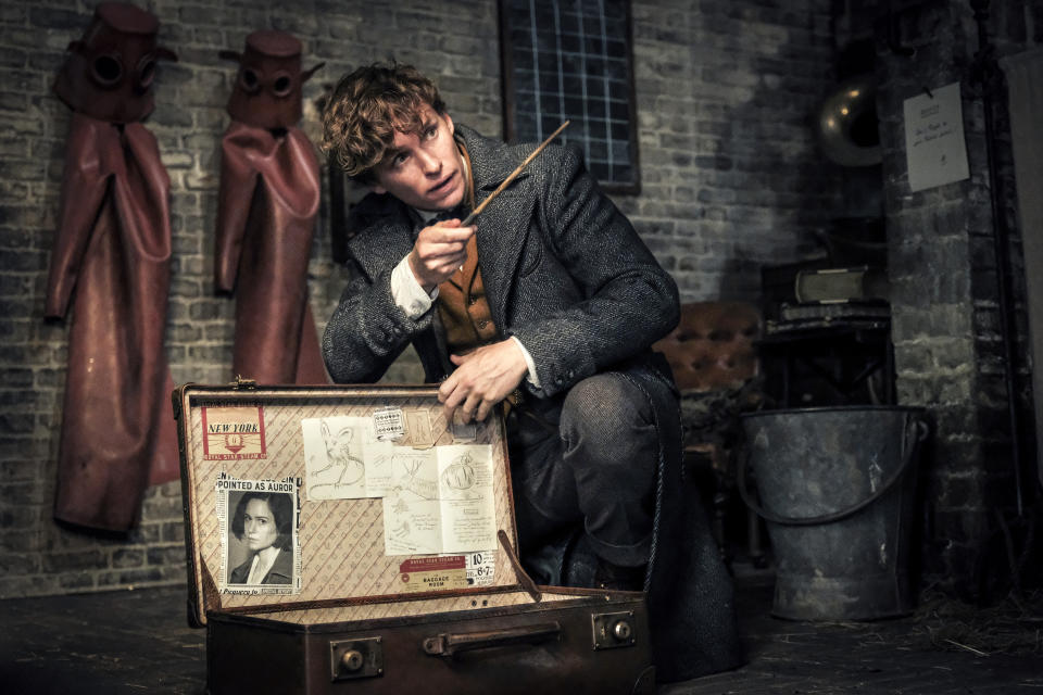 This image released by Warner Bros. Pictures shows Eddie Redmayne in a scene from "Fantastic Beasts: The Crimes of Grindelwald." (Jaap Buitendijk/Warner Bros. Pictures via AP)