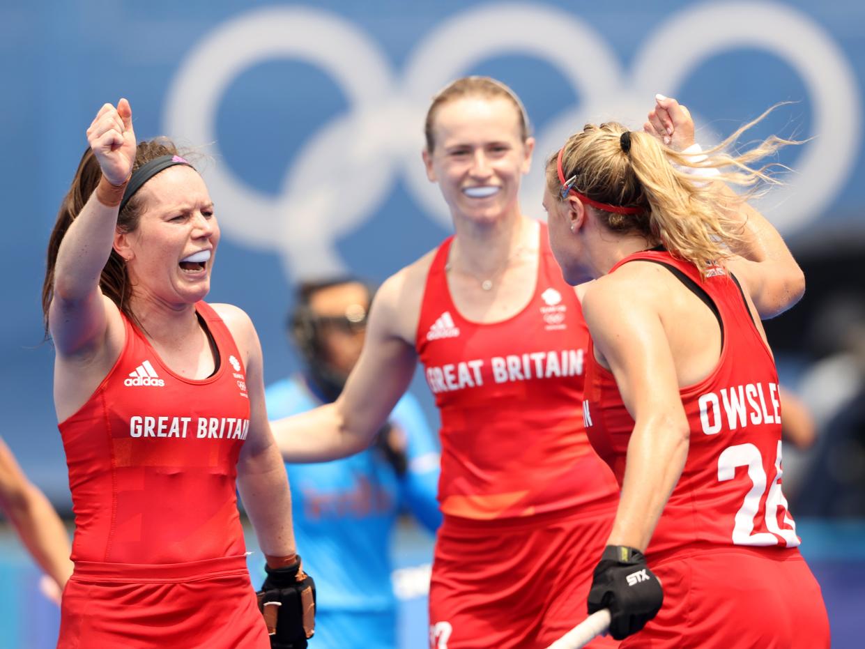 Lily Owsley of Team Great Britain celebrates scoring the third goal with Laura Unsworth during the Women's Preliminary Pool A match between Great Britain and India on day five of the Tokyo 2020 Olympic Games (Getty Images)