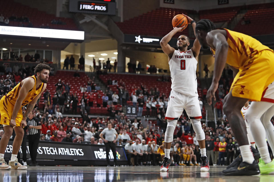 Texas Tech's Kevin Obanor (0) shoots the game-winning free throw during overtime of an NCAA college basketball game against Iowa State, Monday, Jan. 30, 2023, in Lubbock, Texas. (AP Photo/Brad Tollefson)