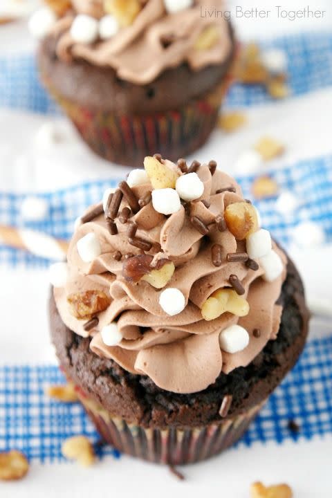 <p>You don't need a bowl of ice cream to enjoy classic Rocky Road flavors. Chocolate, nuts and marshmallows come together gloriously in this party-favorite cupcake.</p><p><strong><a href="http://www.sugarandsoul.co/2014/09/rocky-road-cupcakes.html" rel="nofollow noopener" target="_blank" data-ylk="slk:Get the recipe at Sugar & Soul.;elm:context_link;itc:0;sec:content-canvas" class="link ">Get the recipe at Sugar & Soul.</a></strong></p>