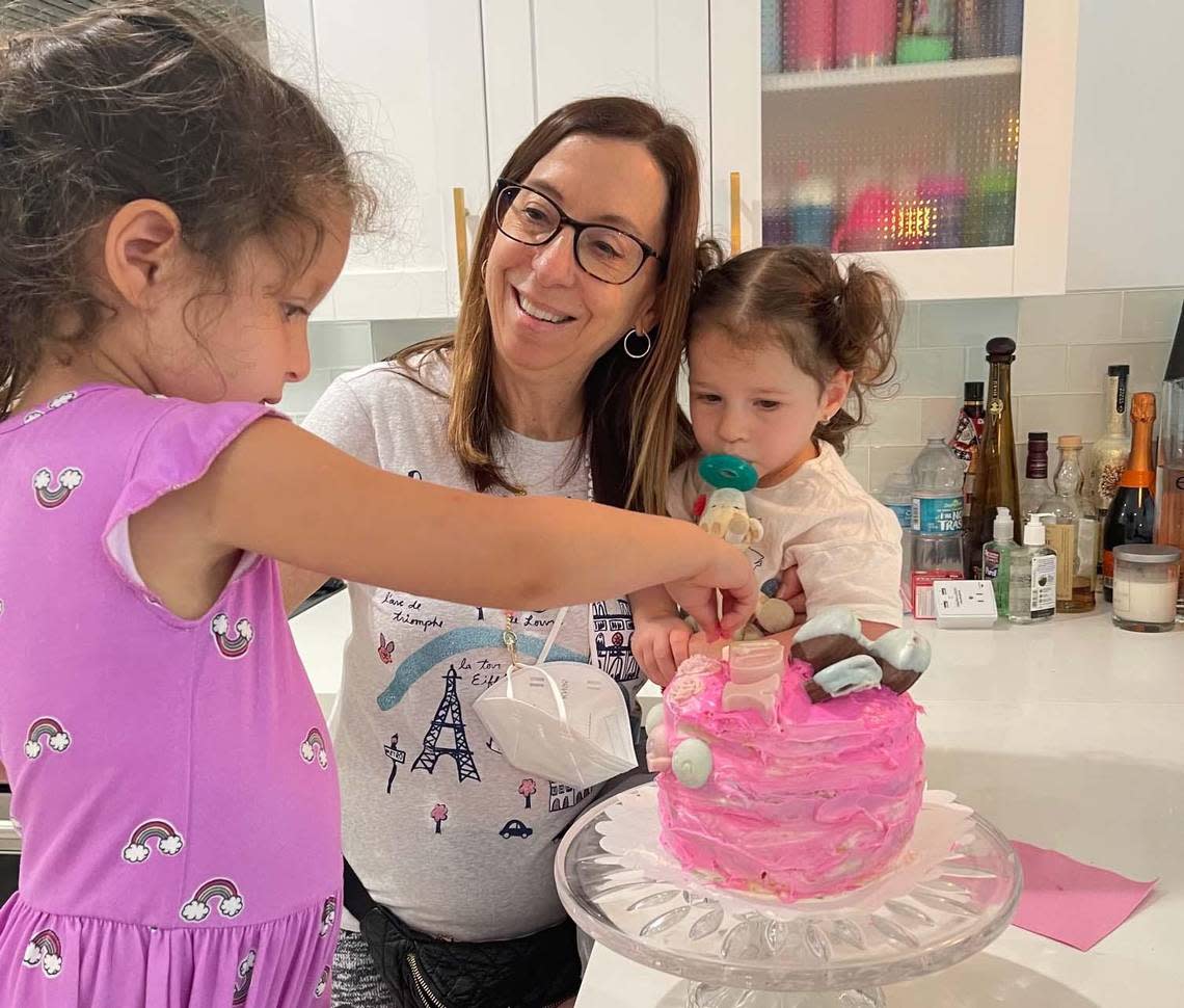 Judy Spiegel with her grandaughters Scarlett, left, and Sloane. Spiegel was one of the 98 people killed in the condo collapse of Champlain Towers South in Surfside, Florida, on June 24, 2021.