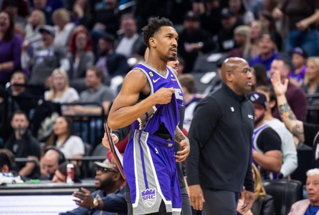 Sacramento Kings guard Malik Monk (0) walks off the court after being called for a technical foul and ejected in the fourth quarter against the Utah Jazz at the NBA basketball game Saturday, March 25, 2023, at Golden 1 Center. Monk disagreed with the referee after missing a dunk following contact from Utah Jazz forward/center Kelly Olynyk (41), with no foul called.