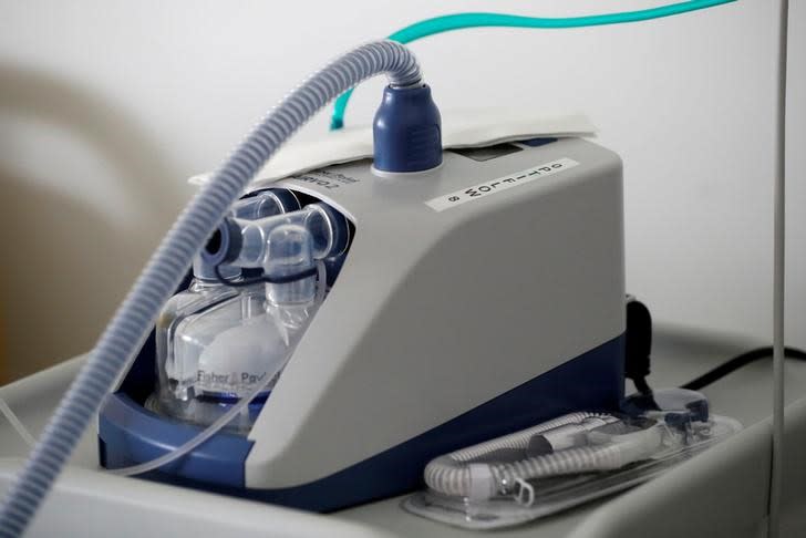 FILE PHOTO: A nasal ventilator is pictured as a patient suffering from coronavirus disease is treated in a pulmonology unit at the hospital in Vannes