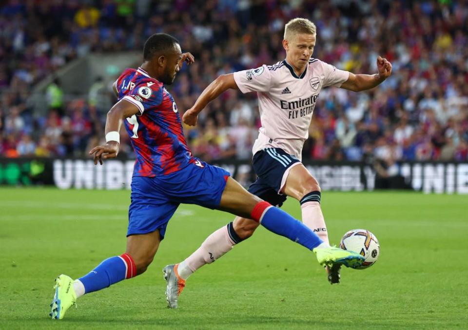 Oleksandr Zinchenko gets away from Jordan Ayew during an assured debut.