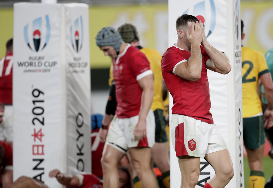 Wales Gareth Davies reacts after Australia's Michael Hooper scored a try during the Rugby World Cup Pool D game at Tokyo Stadium between Australia and Wales in Tokyo, Japan, Sunday, Sept. 29, 2019. (AP Photo/Jae Hong)