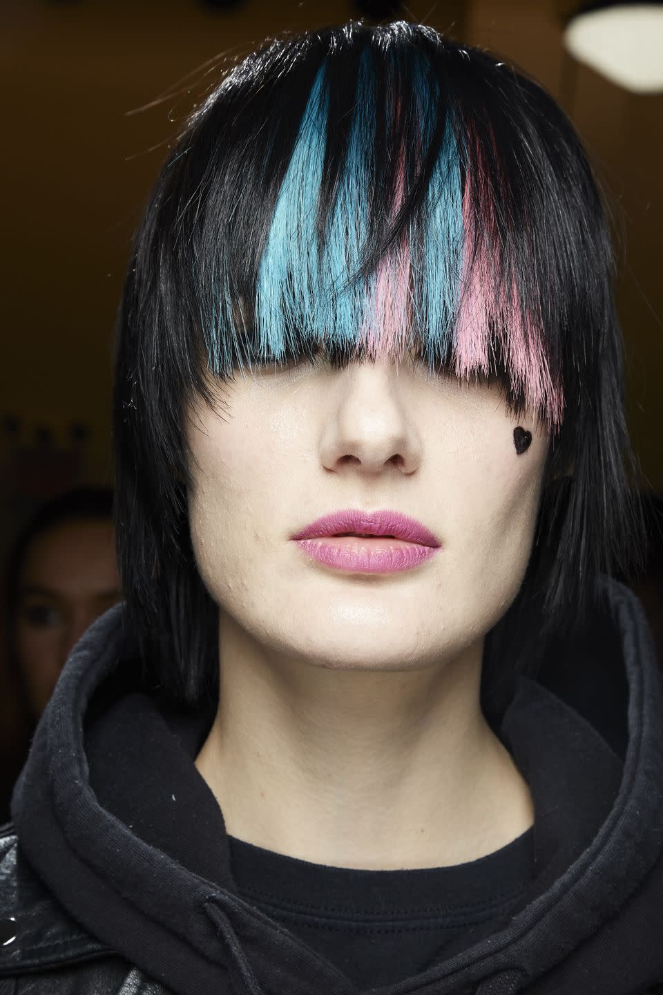 <p>Take some My Little Pony-worthy hair extensions, cut them into a blinding grunge fringe and add a heart-shaped beauty spot and you've got 2021's twist on a classic Halloween goth.</p>