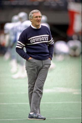 <p>George Gojkovich/Getty</p> Gil Brandt, former executive of the Dallas Cowboys, looks on from the field during a Dec. 1985 game against the Cincinnati Bengals