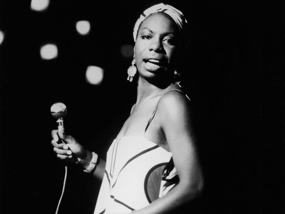 Nina Simone performs in 1964 (Getty)