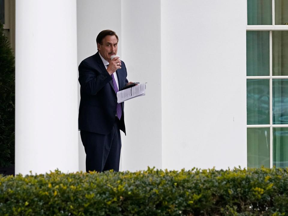 Michael Lindell, CEO of My Pillow, Inc., waits to go into the West Wing of the White House, Friday, Jan. 15, 2021, in Washington.