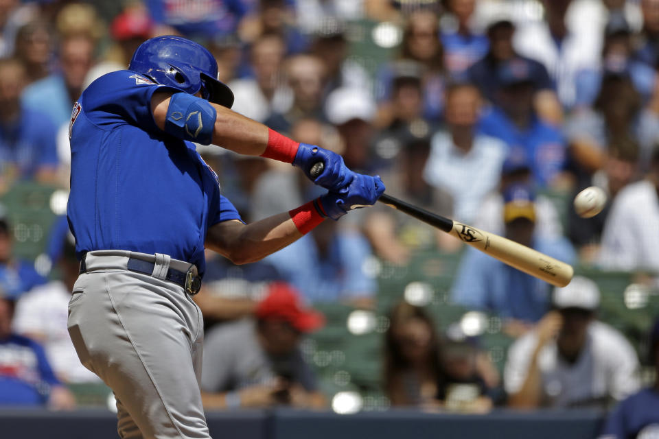 Chicago Cubs' Kyle Schwarber hits a grand slam during the second inning of baseball game against the Milwaukee Brewers Sunday, July 28, 2019, in Milwaukee. (AP Photo/Aaron Gash)