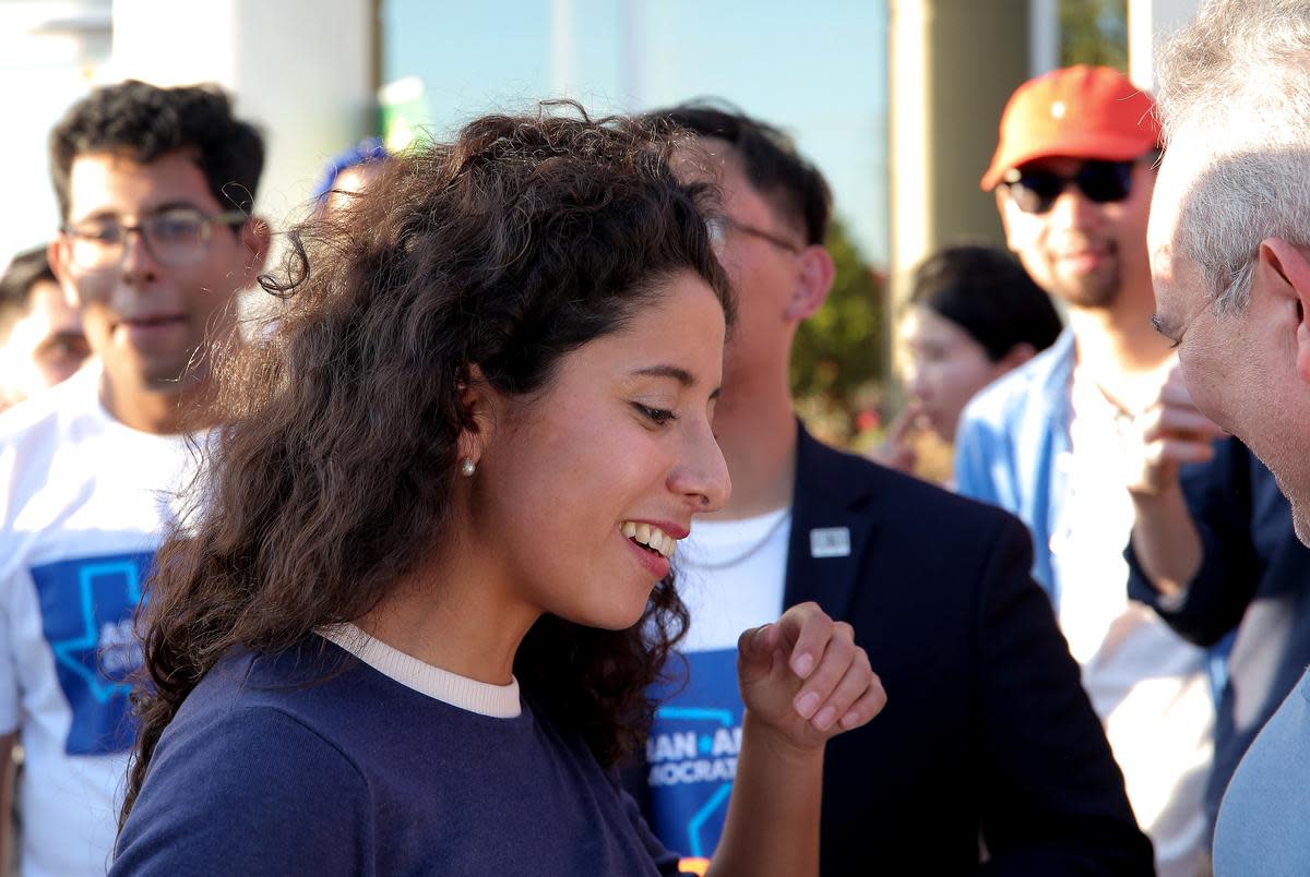 Harris County Judge Lina Hidalgo greets attendees during a Get Out the Vote Rally hosted by the Asian American Democrats of Texas in Asiatown on October 15, 2022.