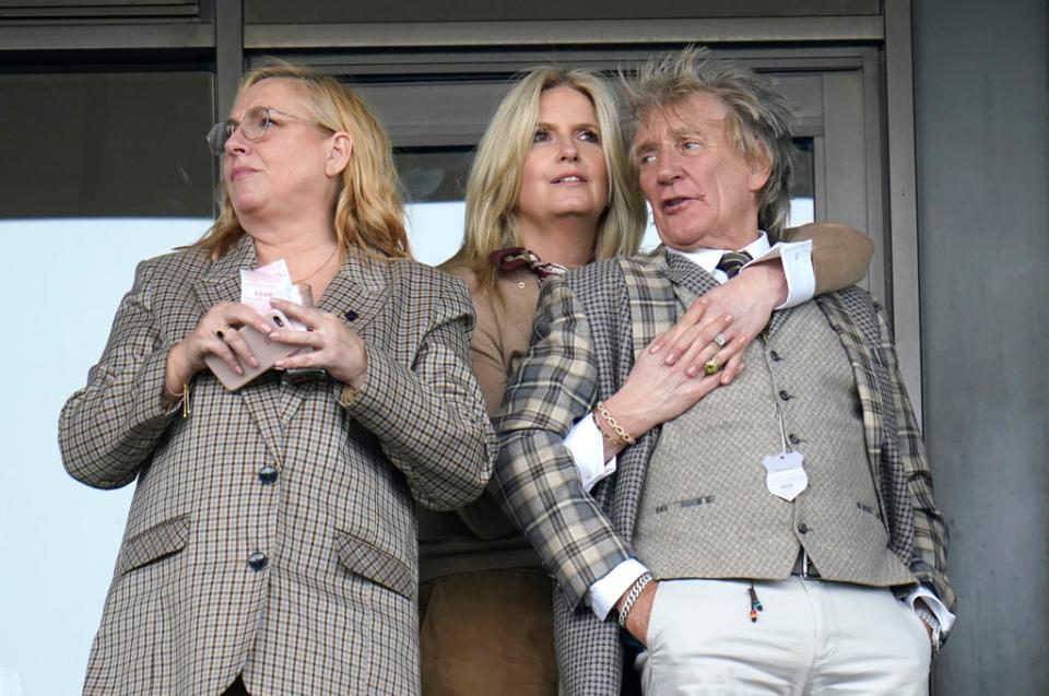 Rod Stewart and Penny Lancaster watch on (PA)