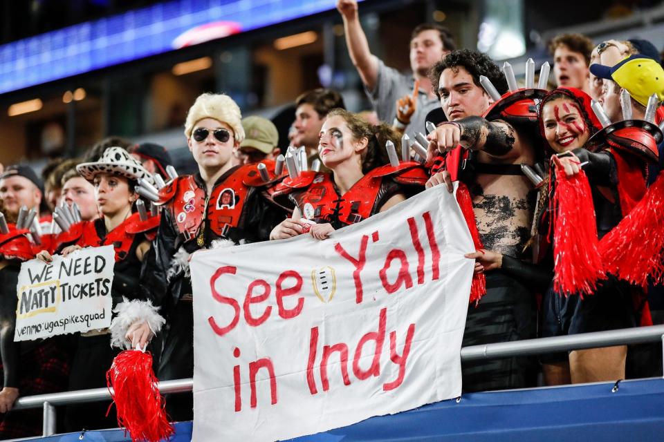 Georgia fans cheer for the Bulldogs against Michigan during the second half of the Orange Bowl at Hard Rock Stadium in Miami Gardens, Florida, on Friday, Dec. 31, 2021.
