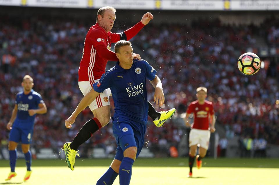 Football Soccer Britain - Leicester City v Manchester United - FA Community Shield - Wembley Stadium - 7/8/16 Manchester United's Wayne Rooney in action with Leicester City's Robert Huth Action Images via Reuters / John Sibley Livepic EDITORIAL USE ONLY. No use with unauthorized audio, video, data, fixture lists, club/league logos or "live" services. Online in-match use limited to 45 images, no video emulation. No use in betting, games or single club/league/player publications. Please contact your account representative for further details.